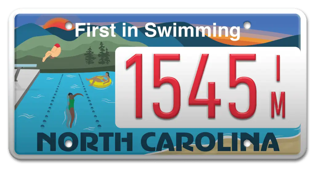 North Carolina "First in Swimming" specialty plate, showing a diver, a lap swimmer, and a tube floater in water stretching from mountains to a sandy shore.
